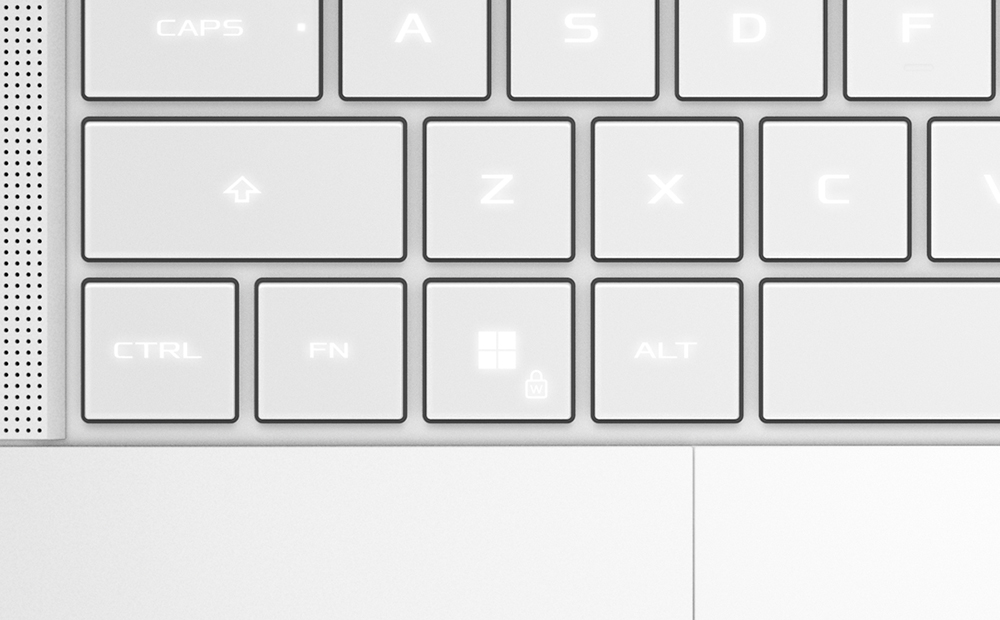 An extreme close up of a Platinum White Zephyrus G14’s keyboard.