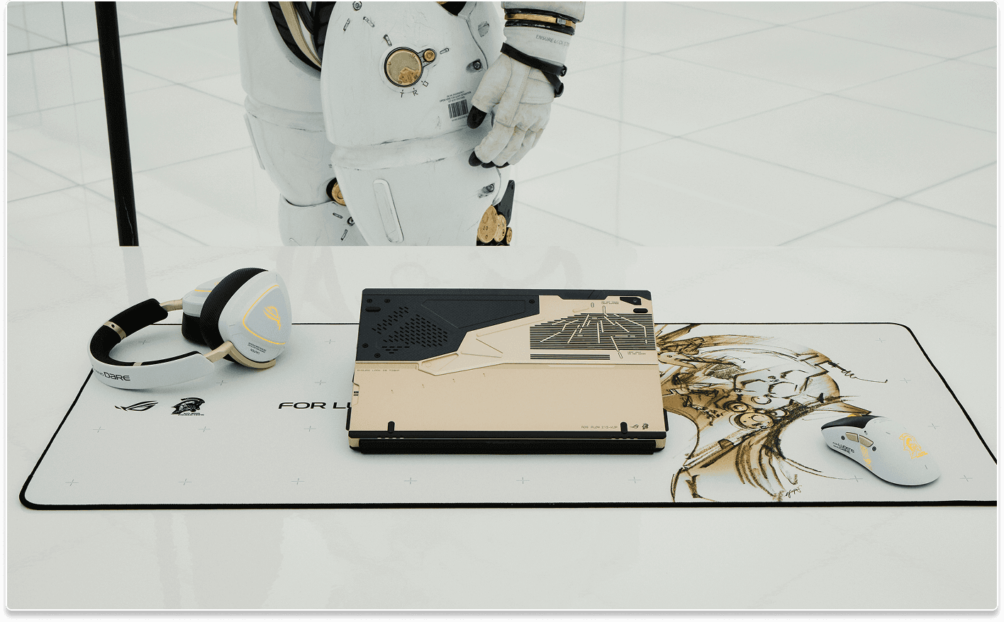 A close up of a table where there are the Flow Z13 KJP, Keris II Origin KJP, Delta II KJP, Scabbard II XXL KJP; behind the table we see the leg area of the Ludens figure