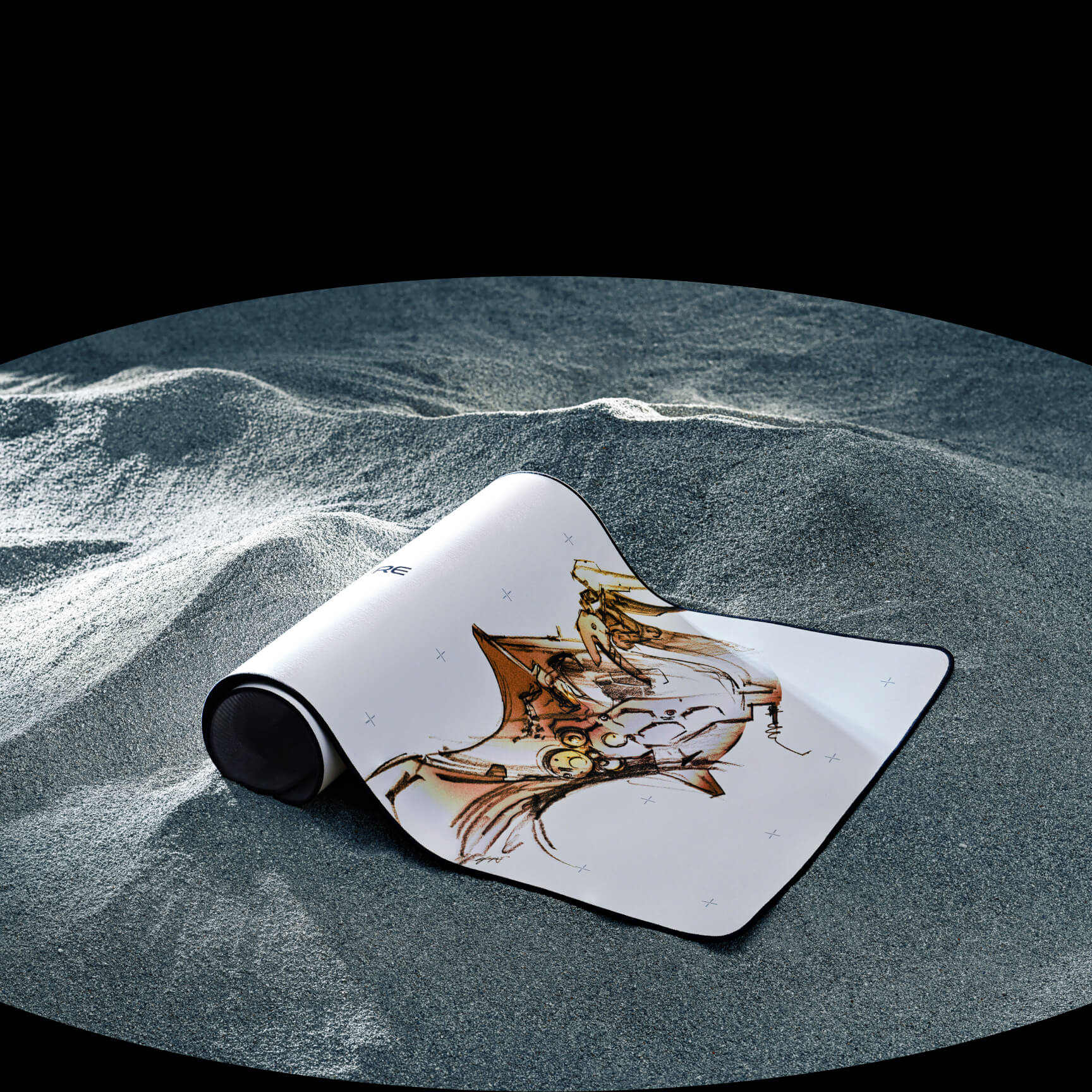 the ROG Scabbard II XXL KJP placed upon a sandy surface and rolled up on one side