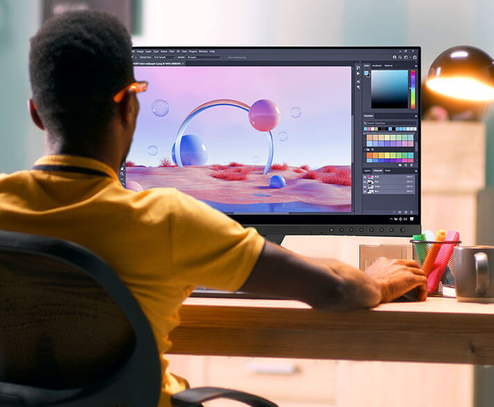 A creator doing photo editing on the ProArt Display
