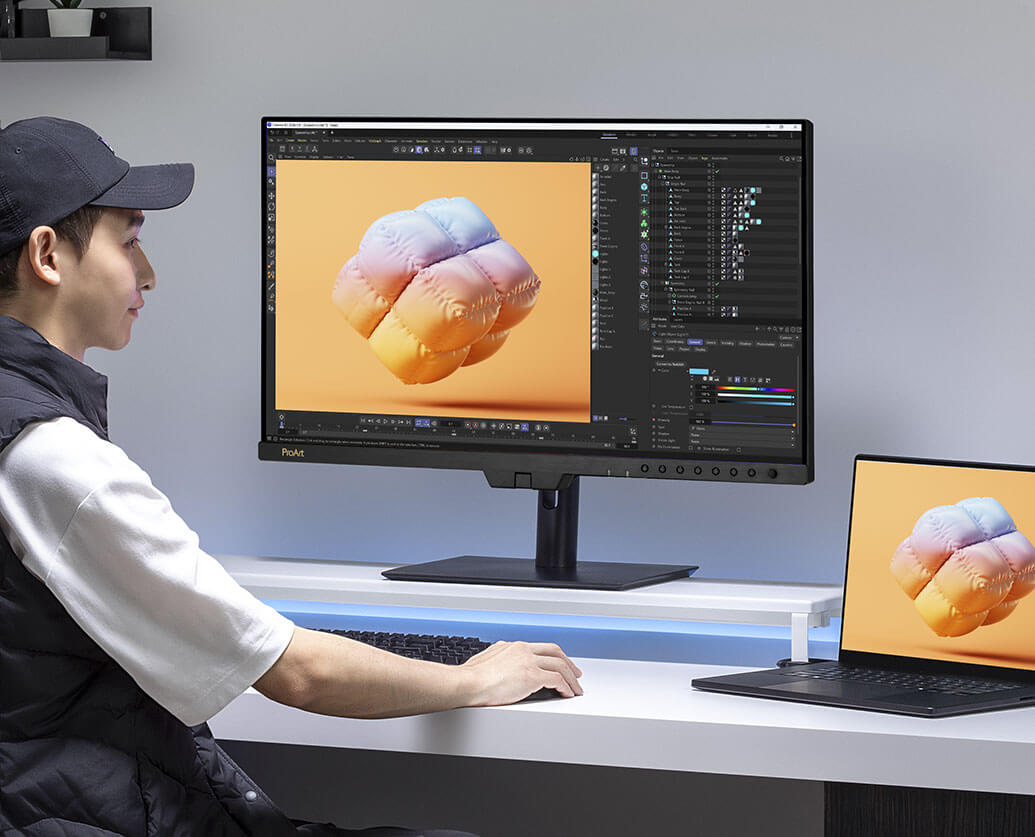 A creator doing gaming project on the ProArt Display