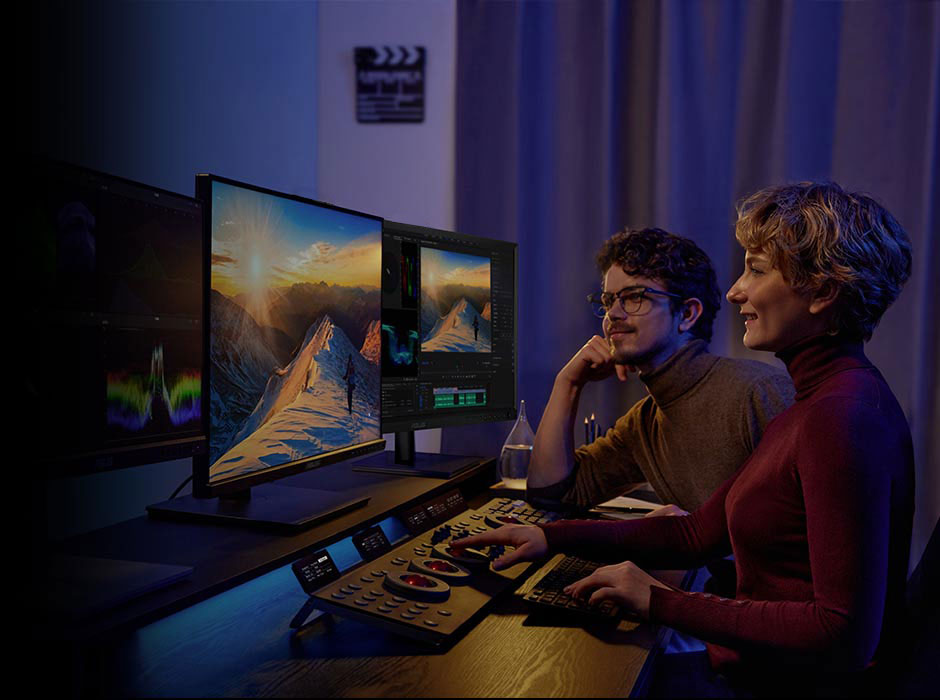 Two creators grading colors with Davinci Resolve on ProArt Display PA27DCE-K.