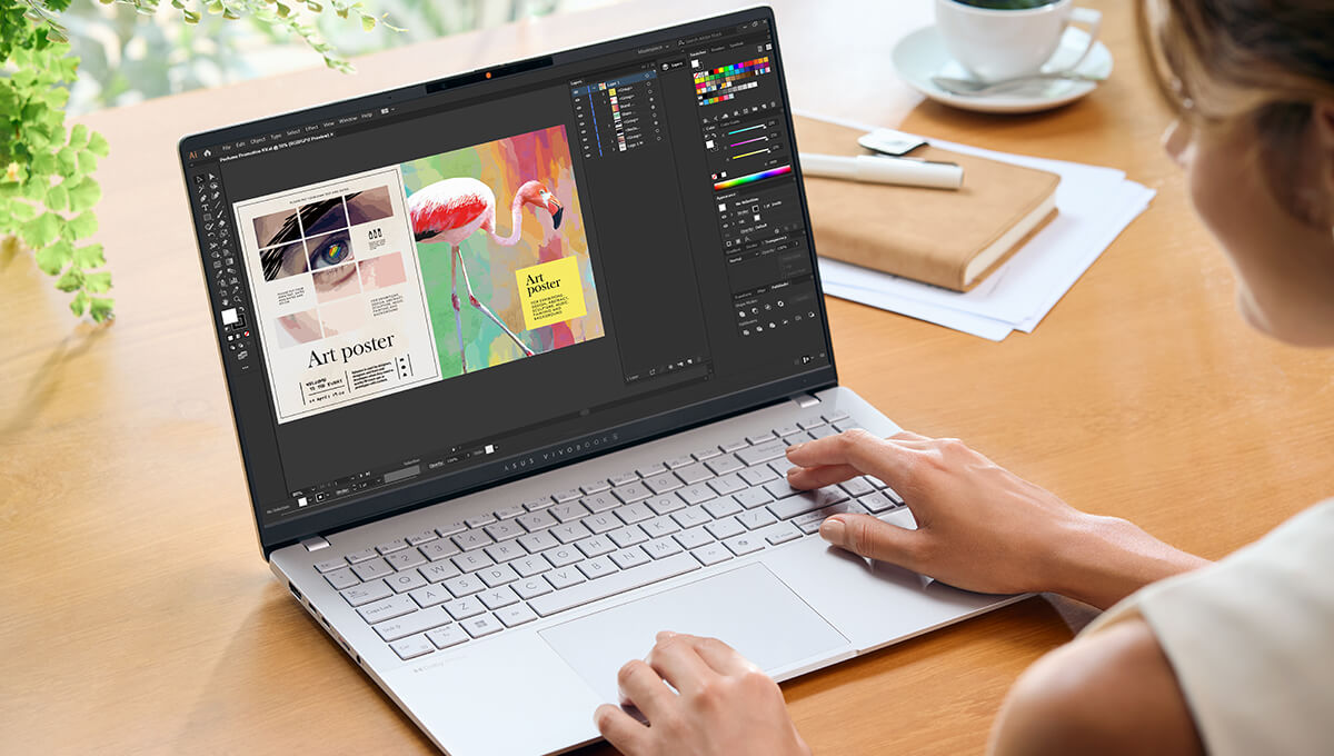a woman using a photo editing app on her ASUS Vivobook S 15 laptop