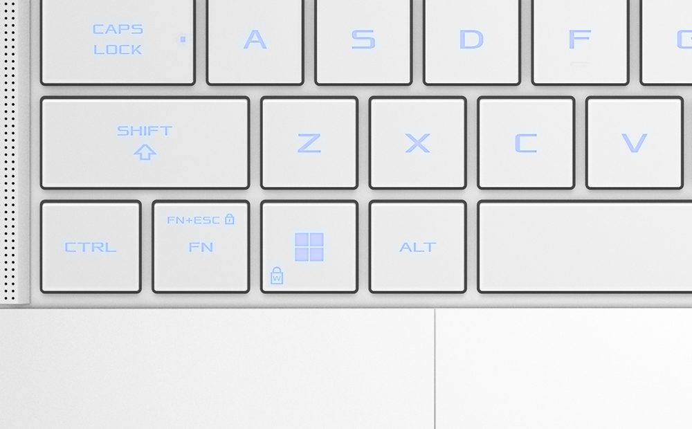 Un primer plano extremo del teclado de un Tri-Fan Technology Zephyrus G14, con énfasis en las teclas de flecha.