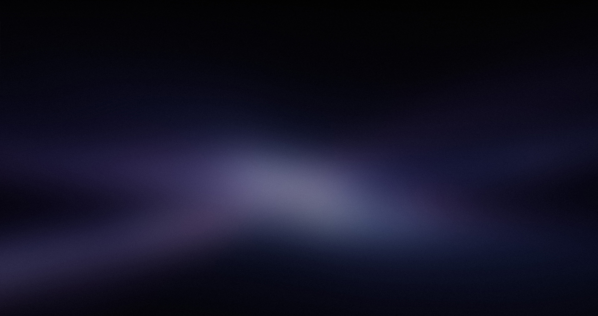 Un fondo con una tonalidad dominante azul-gris oscuro, intercalada con plata en un efecto degradado.