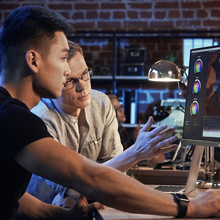 Two colorists discussing the color reproduction of ProArt Display