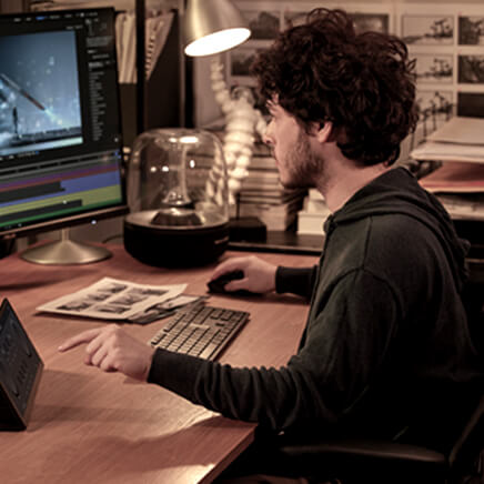 A creator working his project on ProArt Display