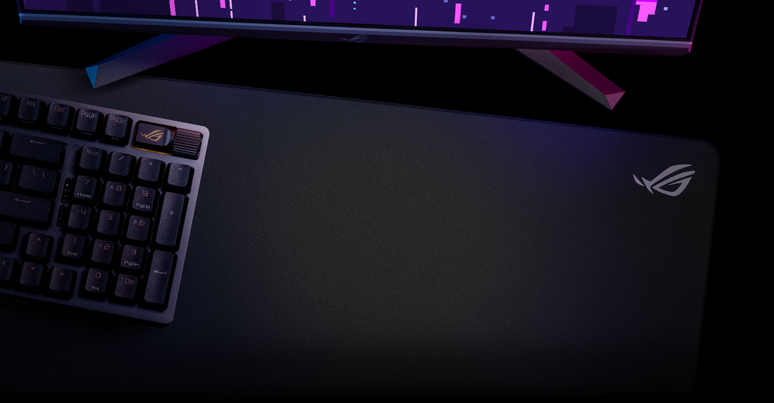 ROG Strix Impact III Wireless on an orange background