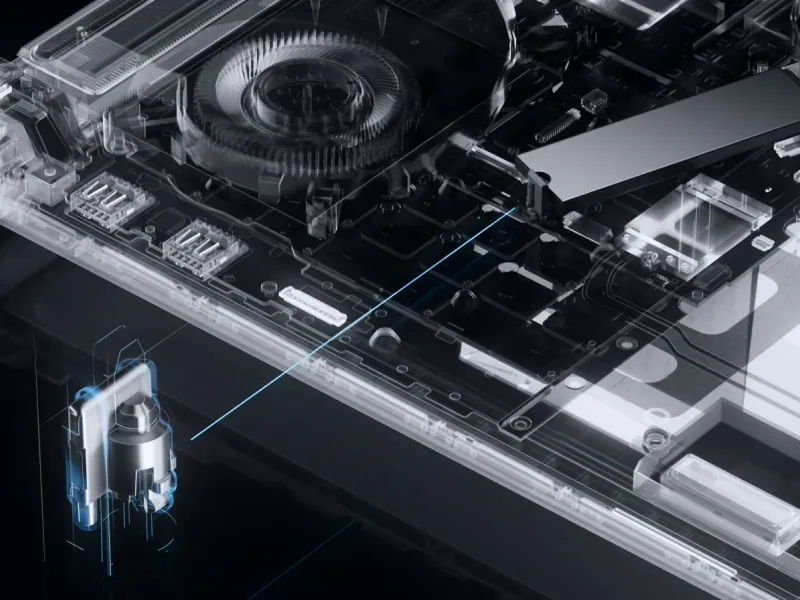 O vedere cu raze X a unui laptop ROG Strix, cu ventilatoare, stocare și alte circuite.
