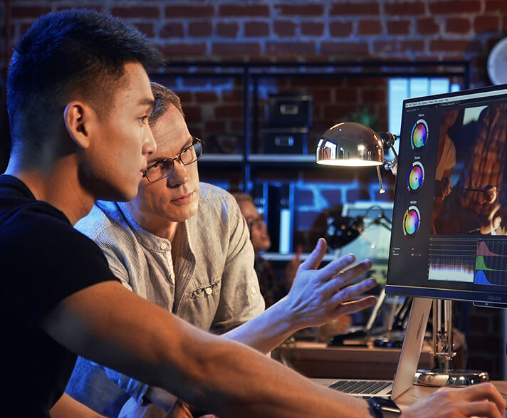 Two colorists discussing the color reproduction of ProArt Display PA27UCDMR