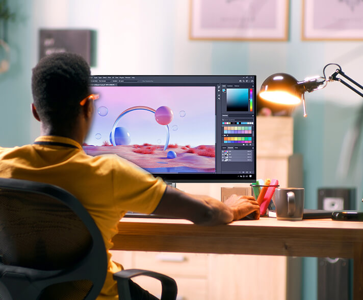 A creator doing photo editing on the ProArt Display