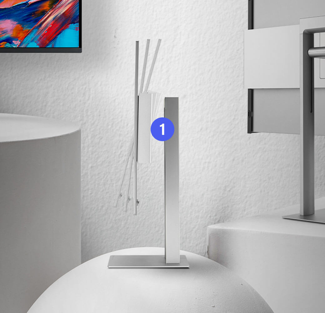 Ergonomic monitor stand with tilt, pivot, and height adjustment for optimal viewing comfort.