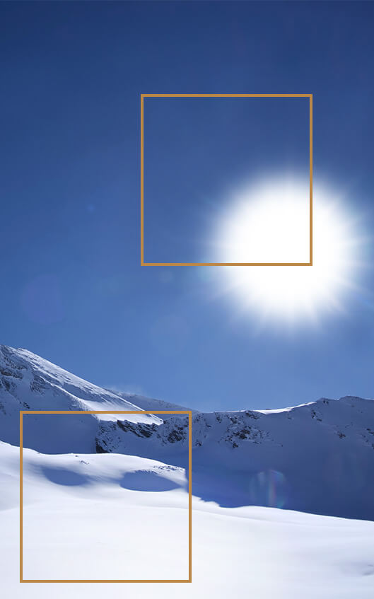 With the PQ Hard Clip setting applied, the sun and snow in the image appears brighter.