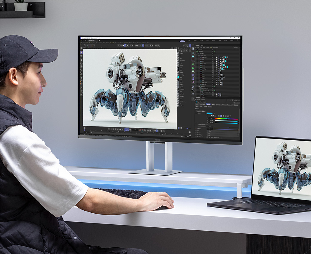 A creator doing gaming project on the ProArt Display