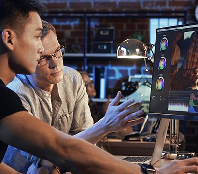 Two colorists discussing the color reproduction of ProArt Display PA27DCE.