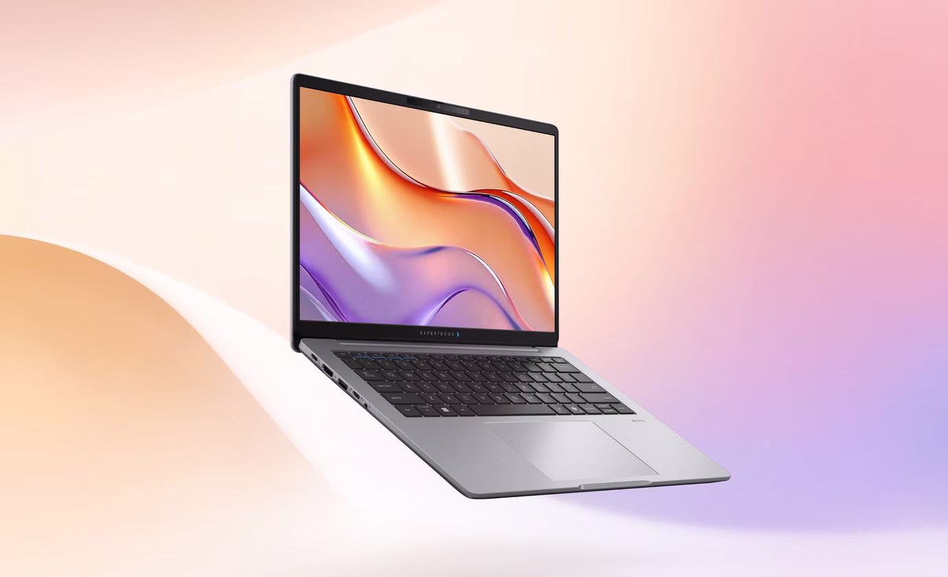 ASUS ExpertBook P3 G2 is placed against a pastel-colored background.