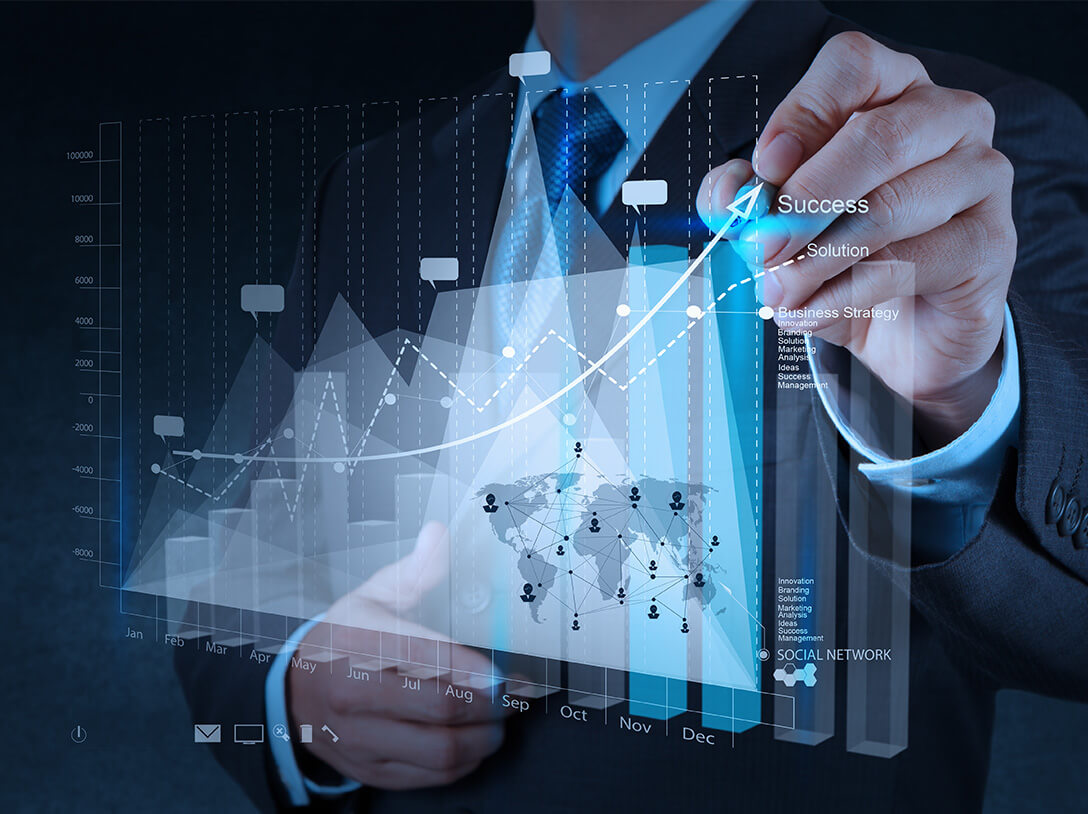 A man is drawing a chart to show business growth